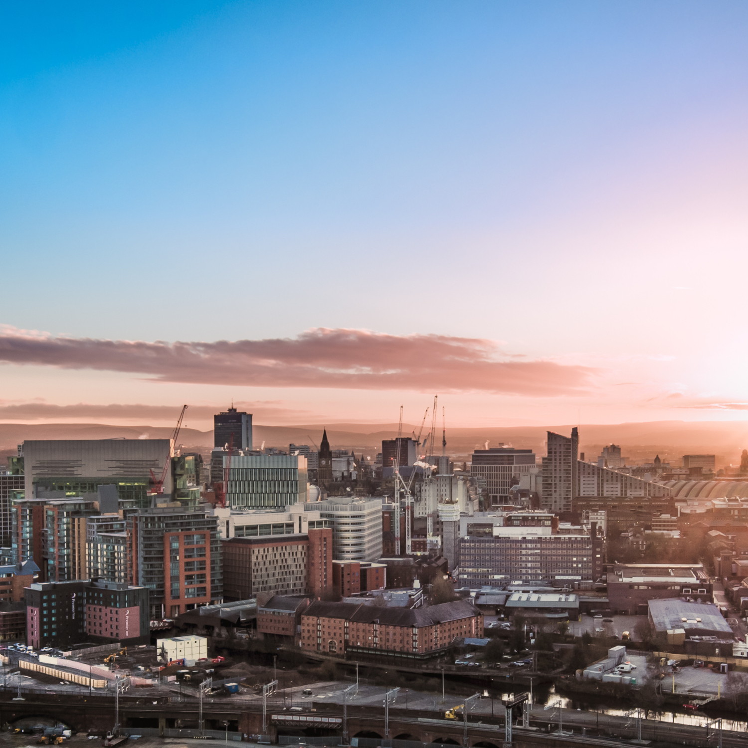 a sky view of the city of Manchester, UK